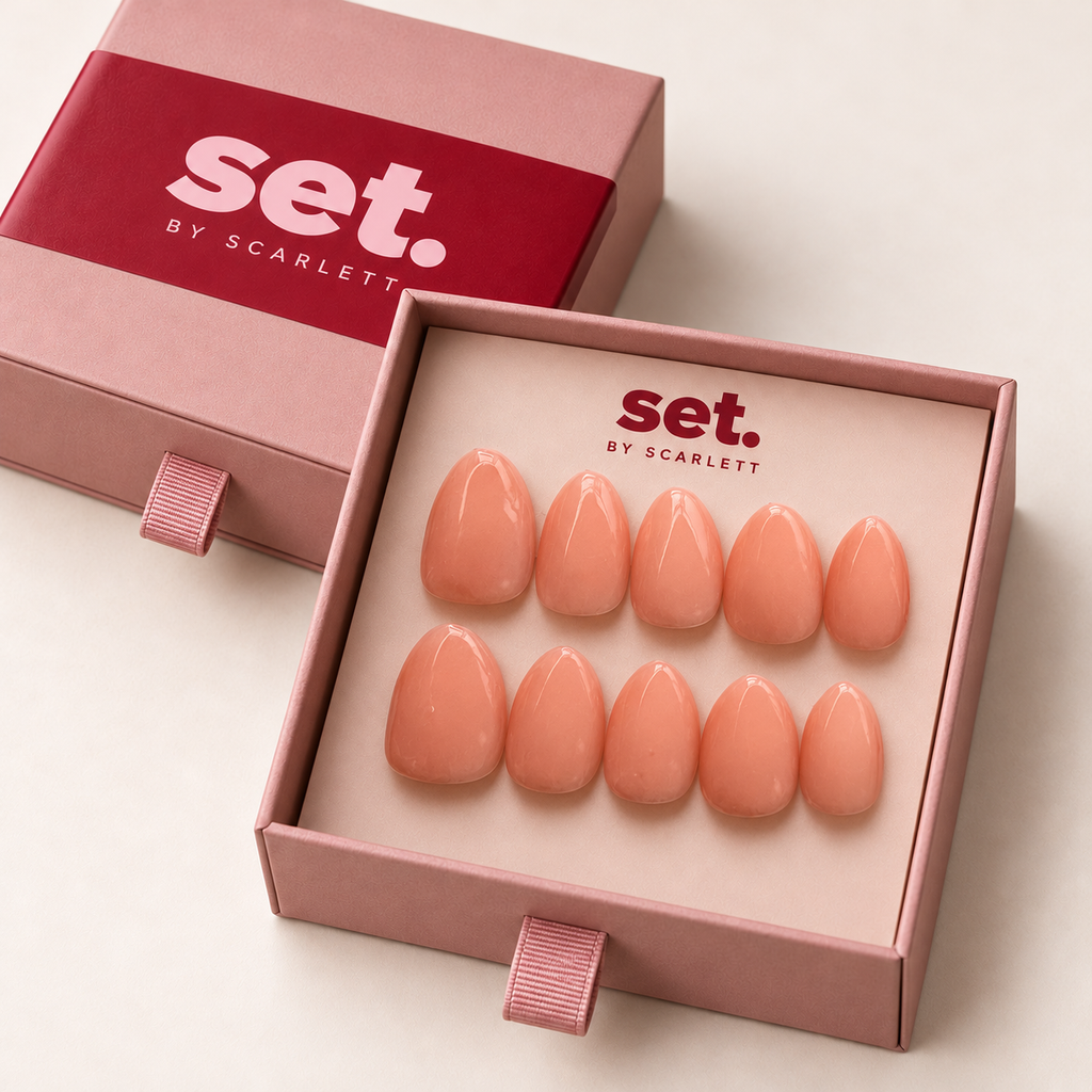 Peach Please: Glossy all-over peach-pink nude. Digitally styled packaging mockup based on Scarlett's photographed nail set.