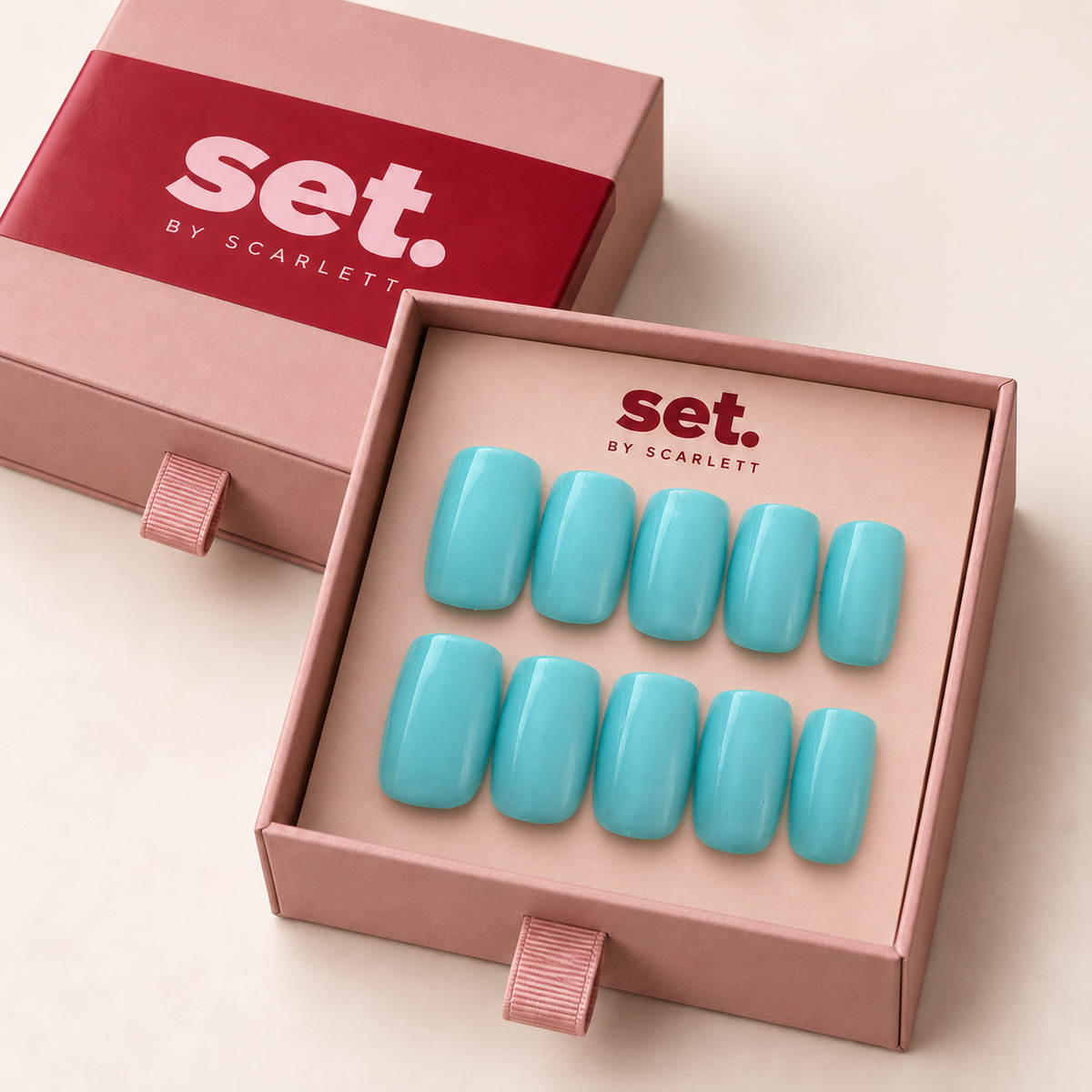 Poolside: All-over turquoise blue with a glossy finish. Digitally styled packaging mockup based on Scarlett's photographed nail set.